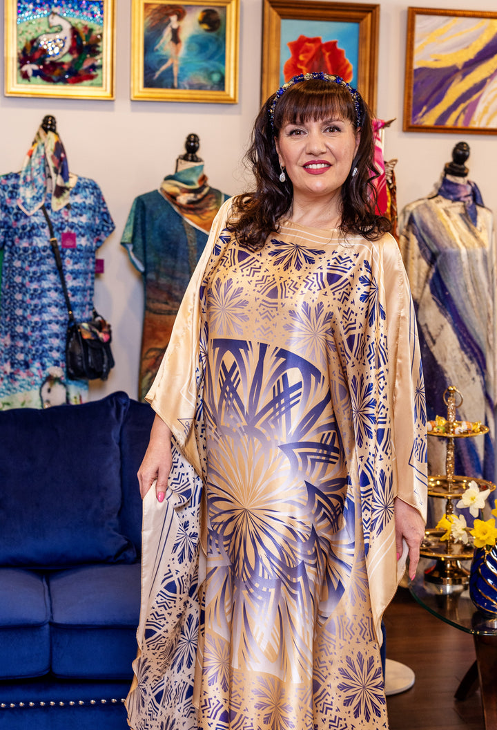 Designer Alesia Chaika in her Alesia C. SERENITY pure silk maxi caftan in a navy blue and gold. AlesiaC.com