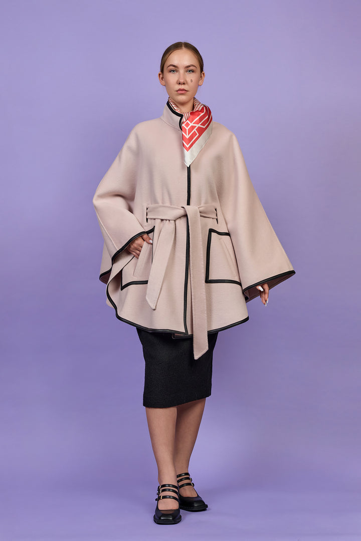 Luxury Blush Ivory Belted Cape Coat in Virgin Wool Cashmere With Black Leather Trim in Lake Forest Shop, Illinois, USA fashion designer Alesia C. boutique AlesiaC,com