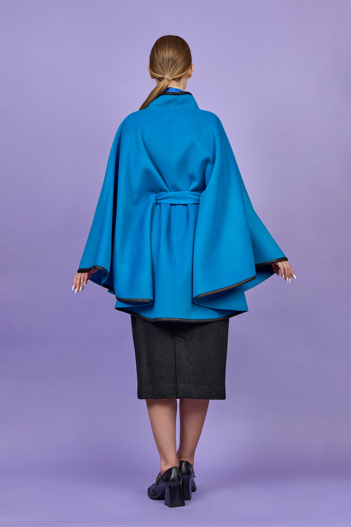 Luxury Bright Blue Belted Cape Coat in Virgin Wool Cashmere With Black Leather Trim in Lake Forest Shop, Illinois, USA fashion designer Alesia C. boutique AlesiaC,com