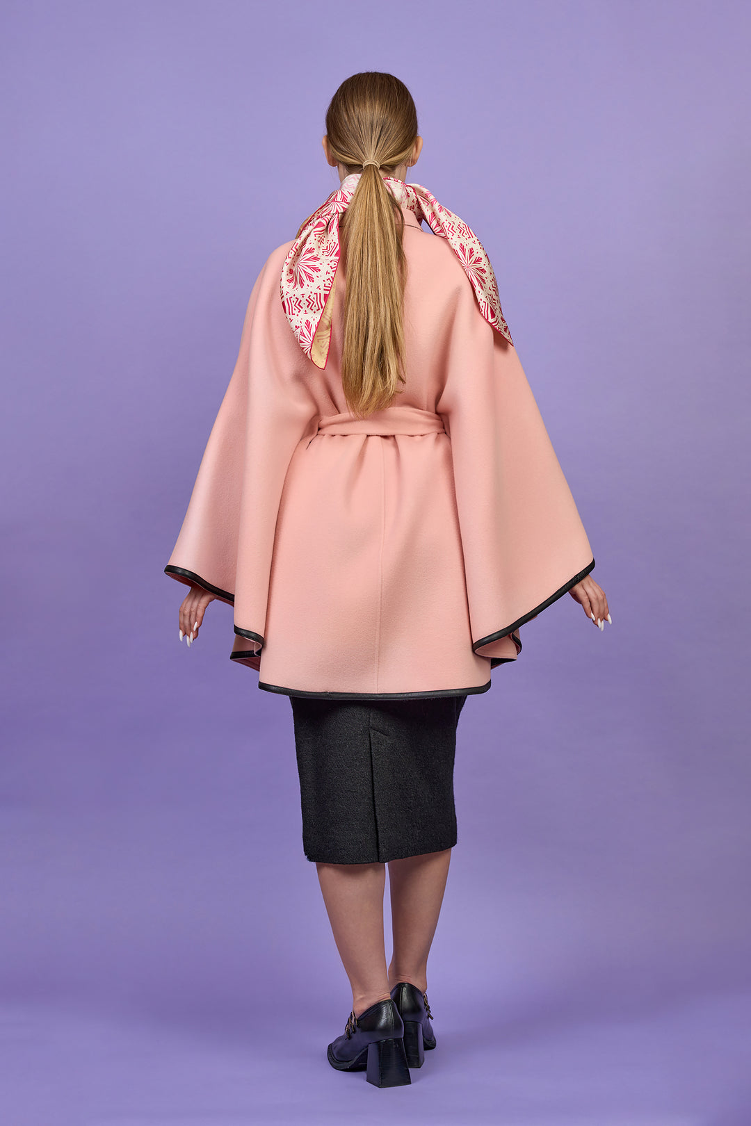 Luxury Light Pink Belted Cape Coat in Virgin Wool Cashmere With Black Leather Trim in Lake Forest Shop, Illinois, USA fashion designer Alesia C. boutique AlesiaC,com